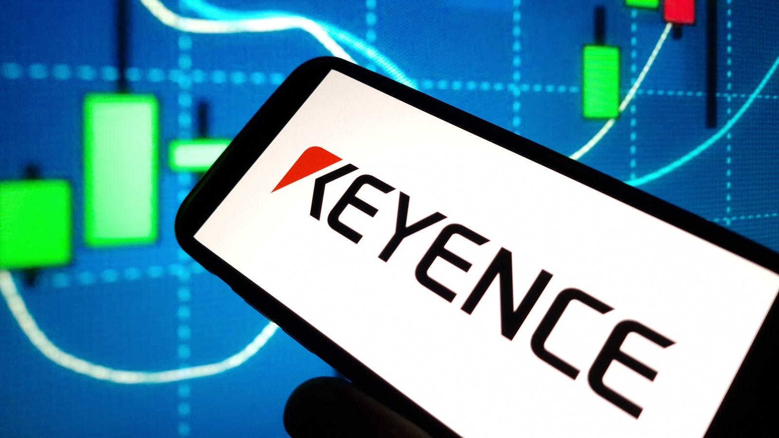 Keyence company logo displayed on mobile phone