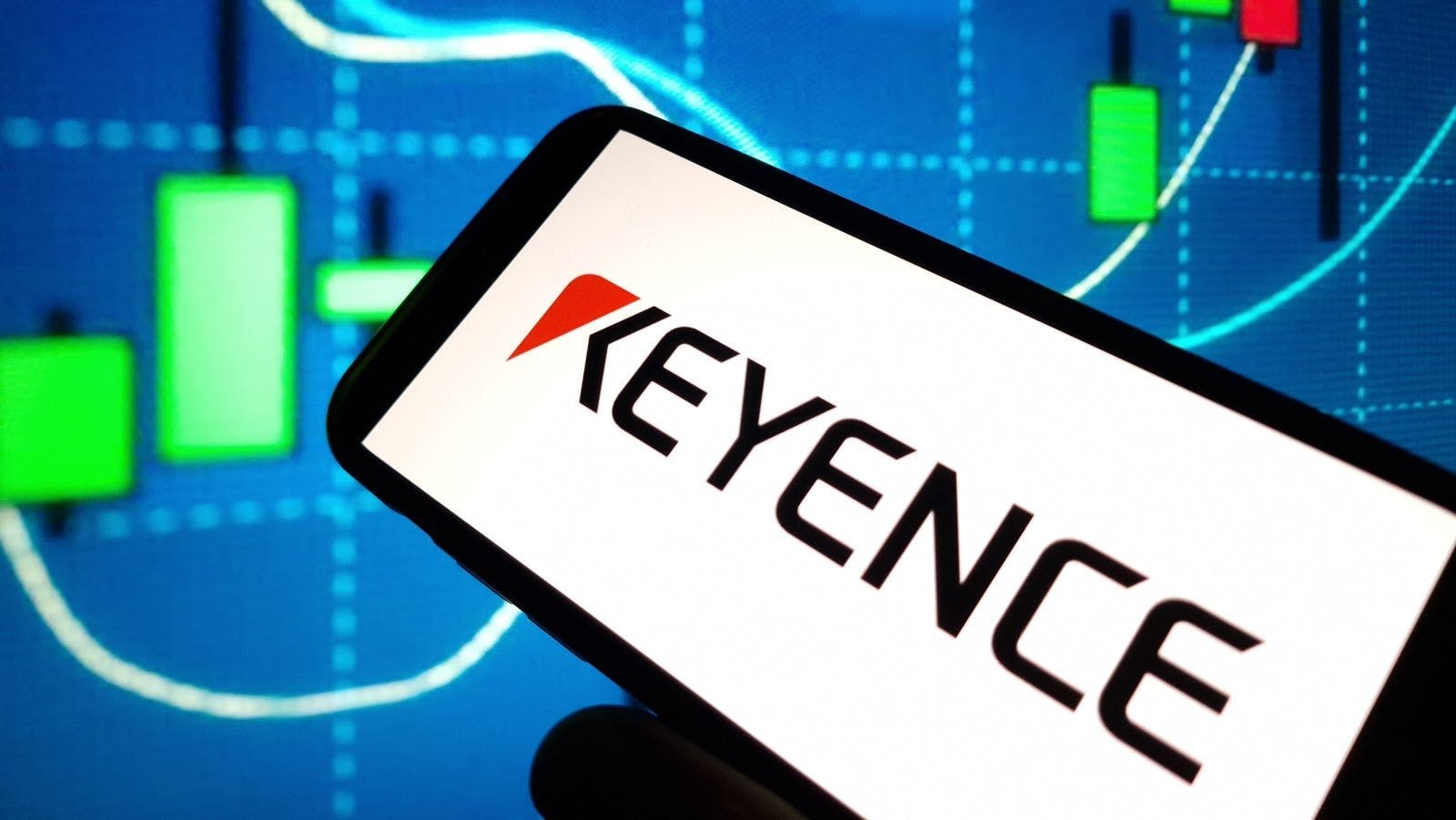 Keyence company logo displayed on mobile phone