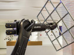 Kuka robot on Schunk assembly electronics line Kuka robot on Schunk assembly electronics line