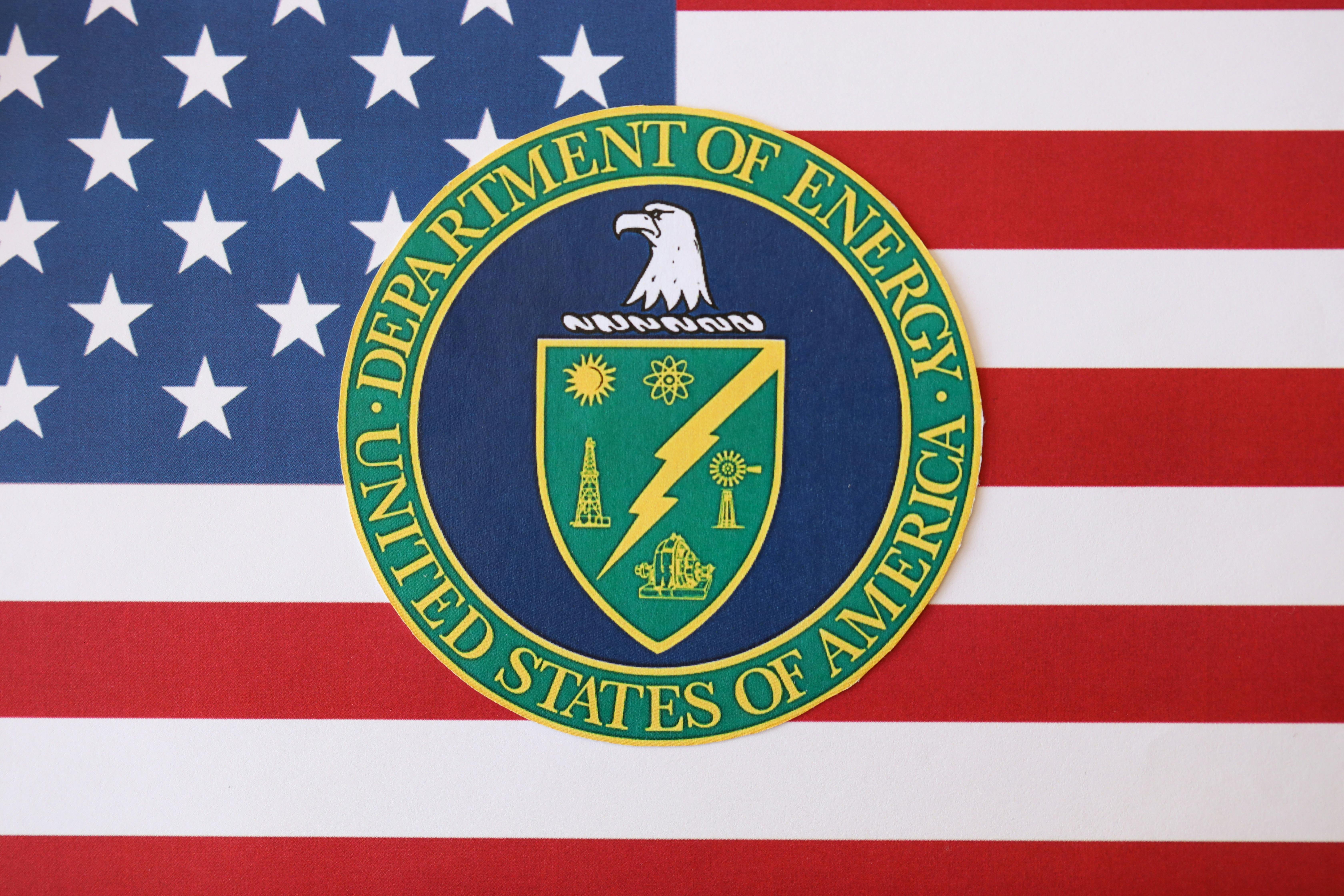 U.S. Department of Energy seal on United States of America flag close up