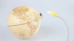 Globe with ethernet cable showing connection to the world
