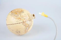 Globe with ethernet cable showing connection to the world Globe with ethernet cable showing connection to the world