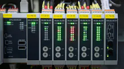 Programmable Logic Controller (PLC) comprised of analog and digital input and output with power supply and processor module.