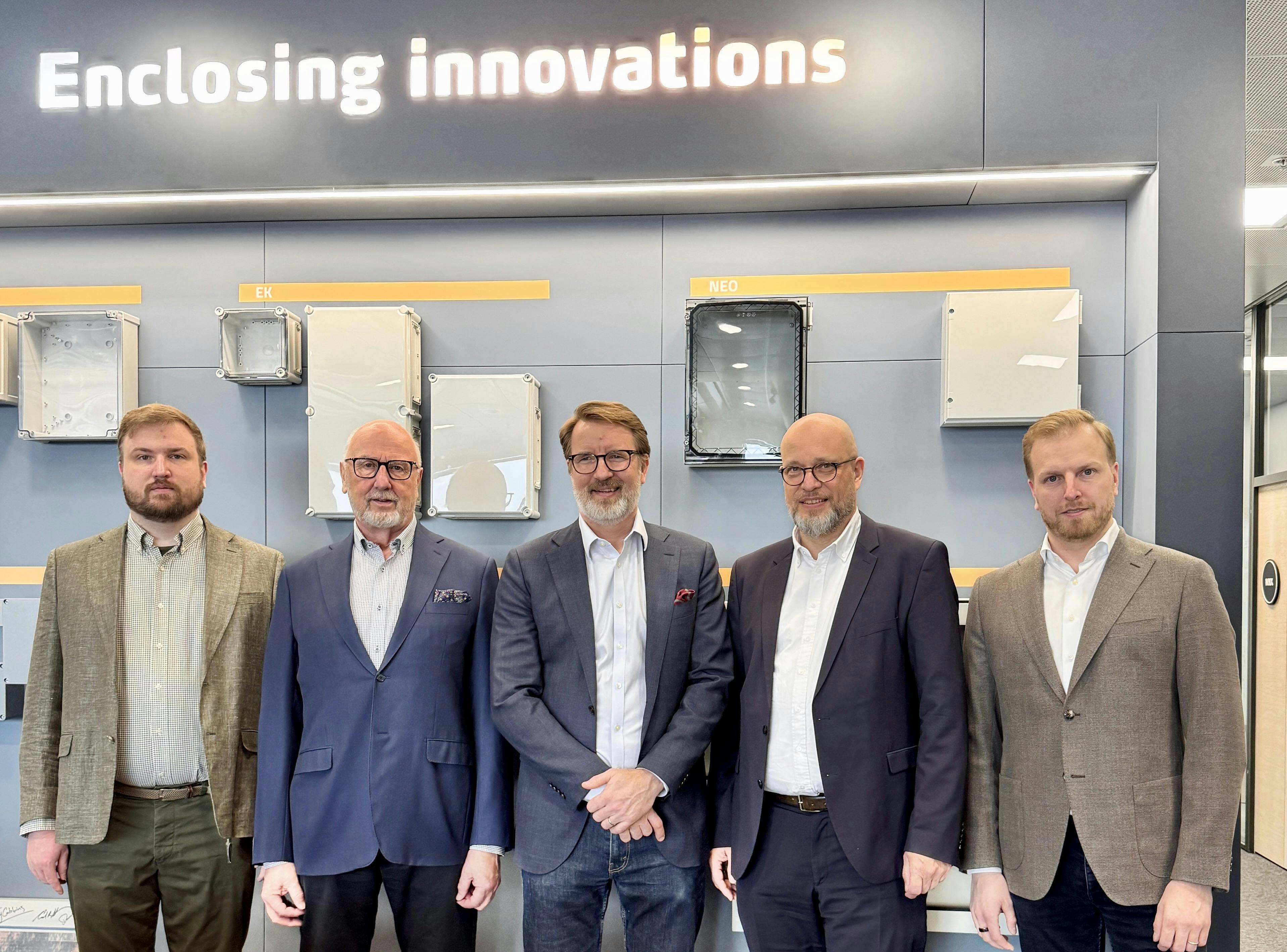 Fibox executive team poses together in the company's office