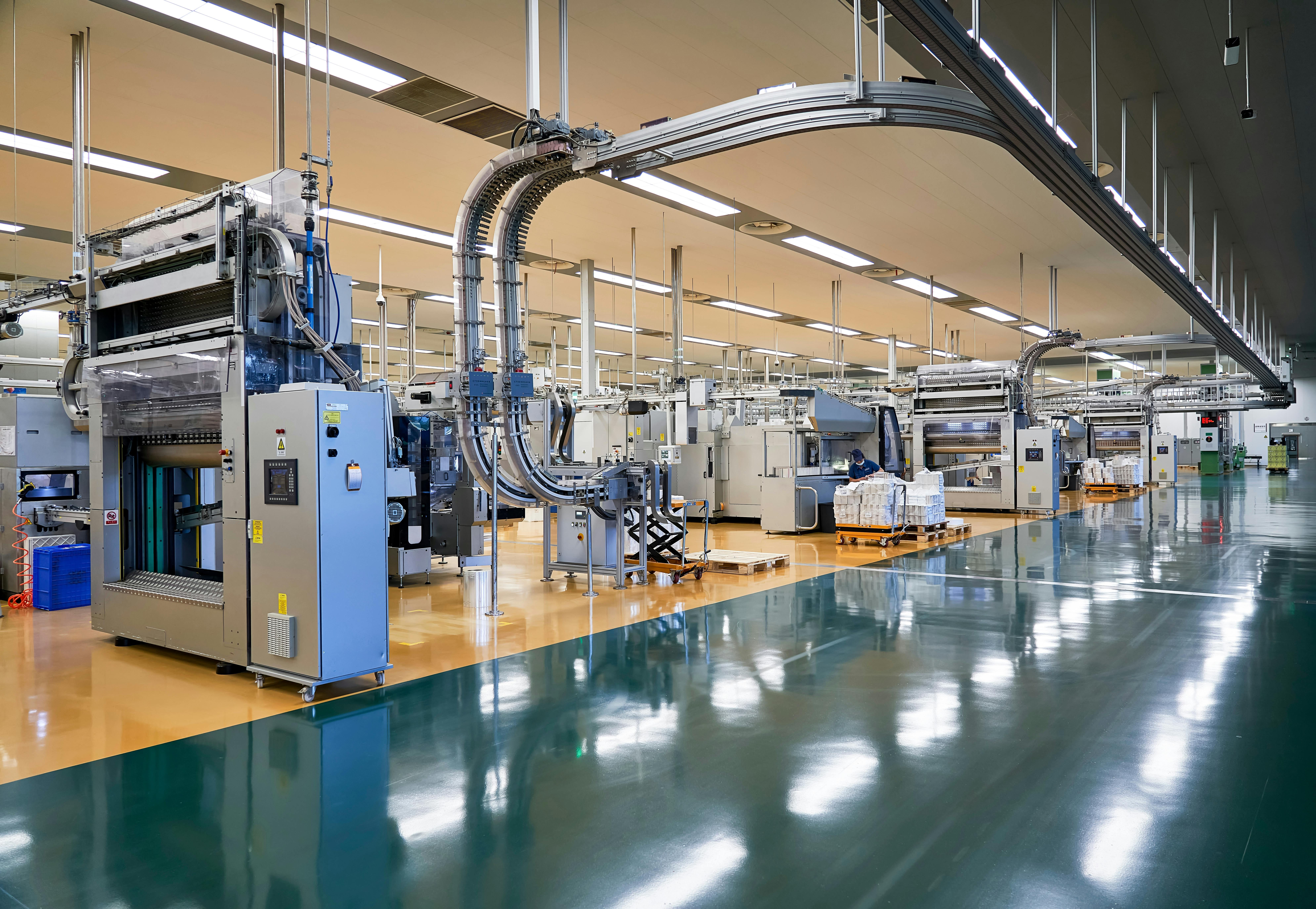 The production line in the cigarette factory is in automatic operation