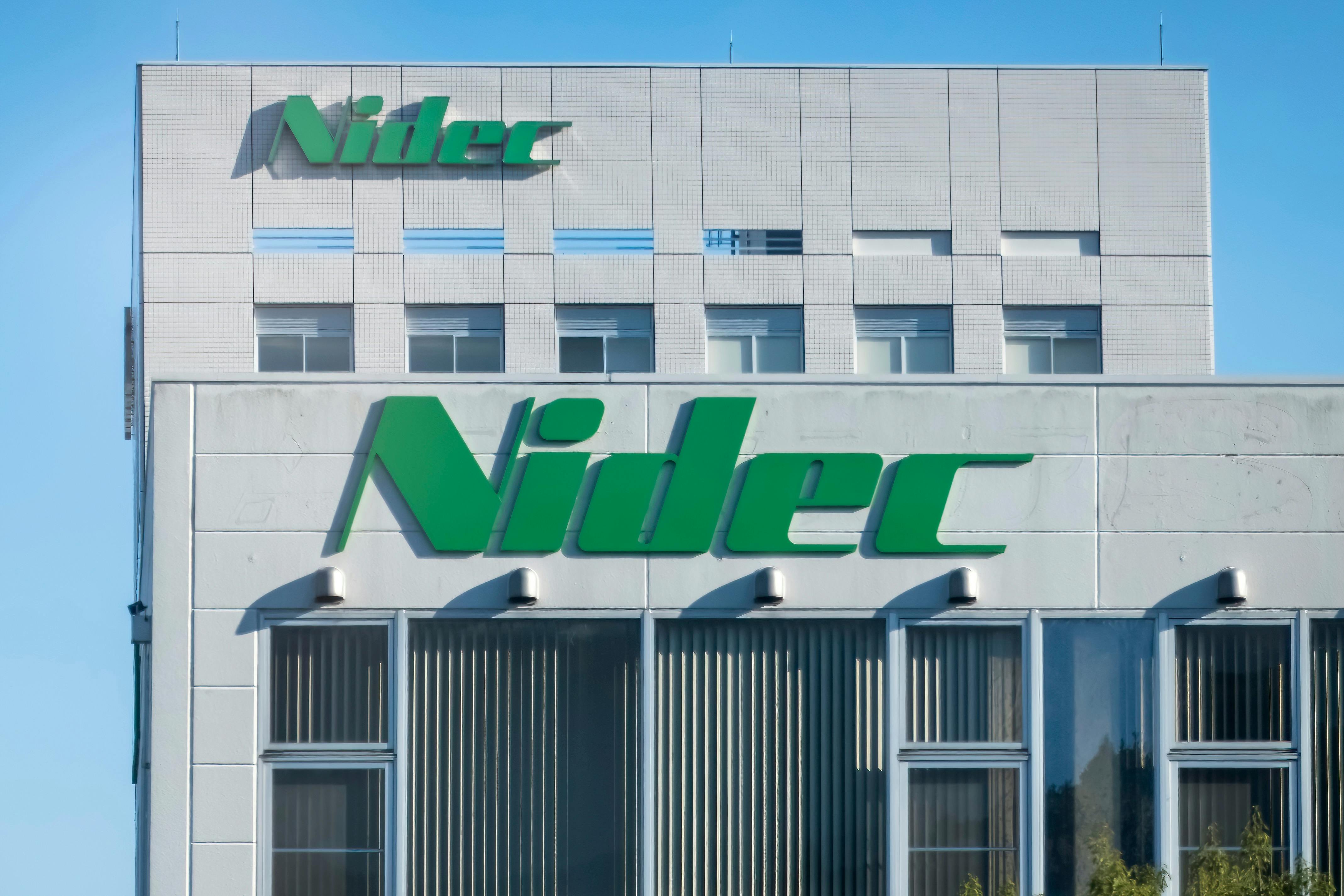 Nidec Corporation logo, a Japanese manufacturer and distributor of electric motors.