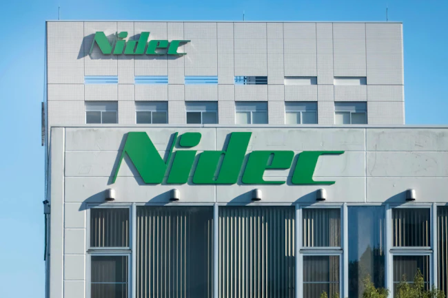 Nidec Corporation logo, a Japanese manufacturer and distributor of electric motors.