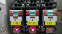 An electrical relay bank inside an industrial control panel.