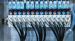 Pneumatic control board in production. Distributor of pneumatic control lines. Industrial photo