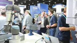 Attendees on the display floor at Automate 2026 in Chicago looking at robots and other industrial technologies. Attendees on the display floor at Automate 2026 in Chicago looking at robots and other industrial technologies.