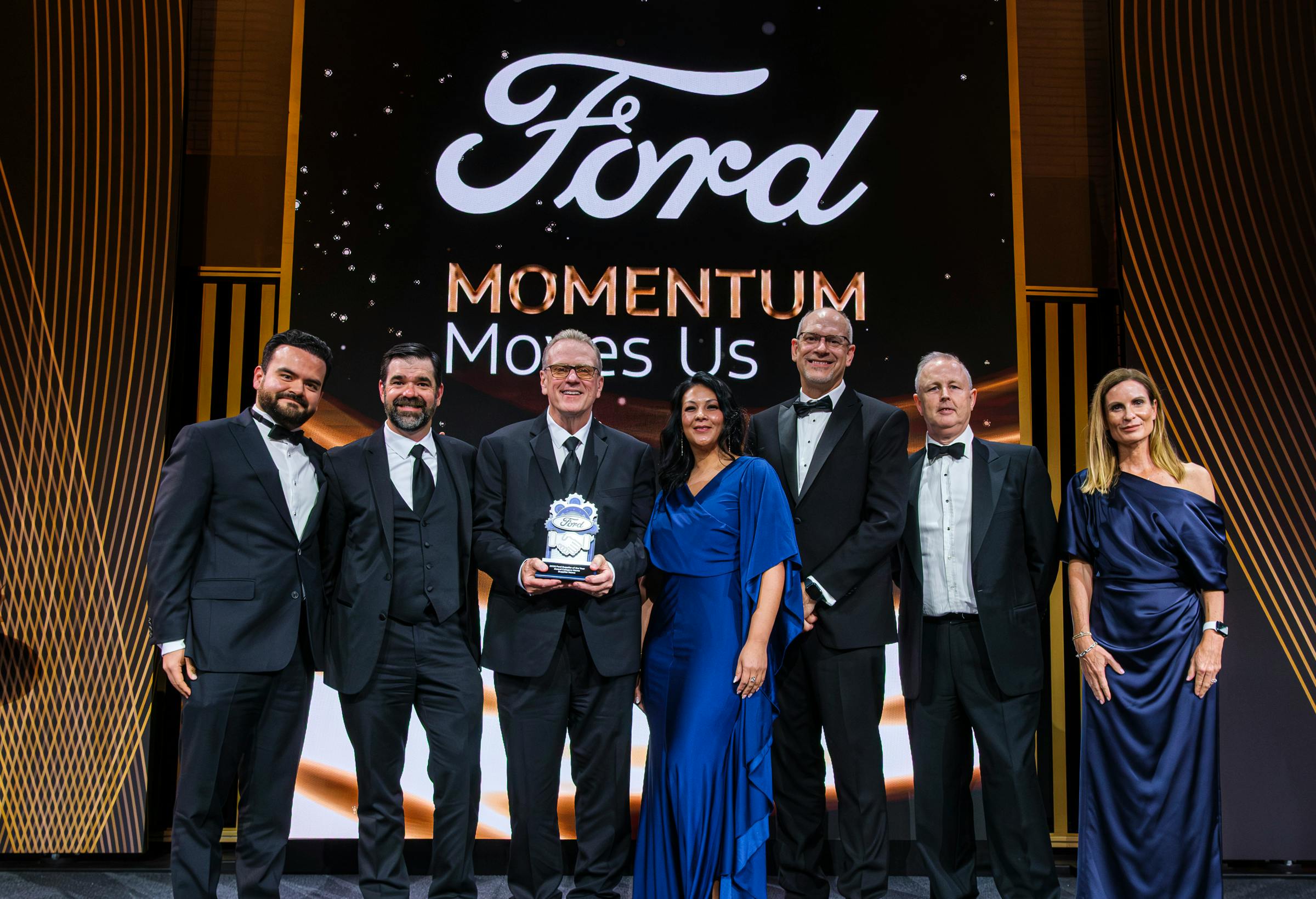 ABB Robotics team being recognized at a ceremony as a 2026 Ford Supplier of the Year