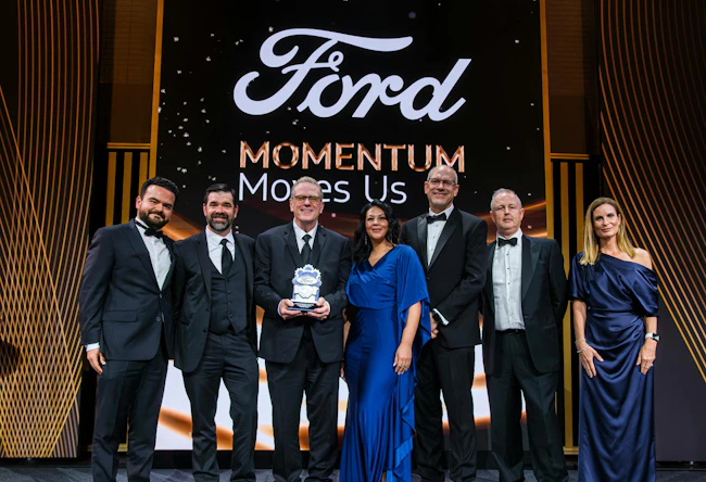 ABB Robotics team being recognized at a ceremony as a 2026 Ford Supplier of the Year