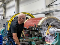 Figure 1: Illustrations based on actual shop-floor photographs can inspire children’s interest in large motor manufacturing.