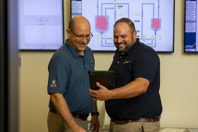 Jeremy Anderson (left), president, and Eric Williams, digitalization group manager, Process and Data Automation (PDA), a CSIA-certified member of the Control System Integrators Association (CSIA).