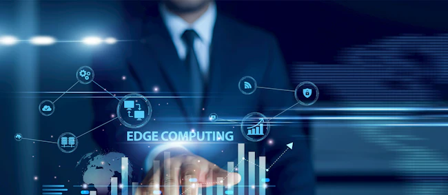 Businessman using tablet analyzing edge computing and growth graph chart, real-time processing, IoT data, cloud integration, decentralized network performance, digital transformation insights.