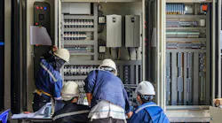 Engineer working on checking and maintenance equipment at wiring on PLC cabinet, Engineer checking status step up transformer