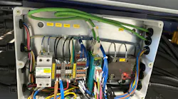 Front view of Dinkle I/O module with multi-colored wires.