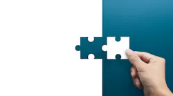 Joint venture, partnership, Mergers and acquisition concept, businessman hand connecting puzzle pieces