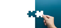 Joint venture, partnership, Mergers and acquisition concept, businessman hand connecting puzzle pieces
