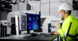 Engineer Doing 3D CAD Model Design On Computer At Factory