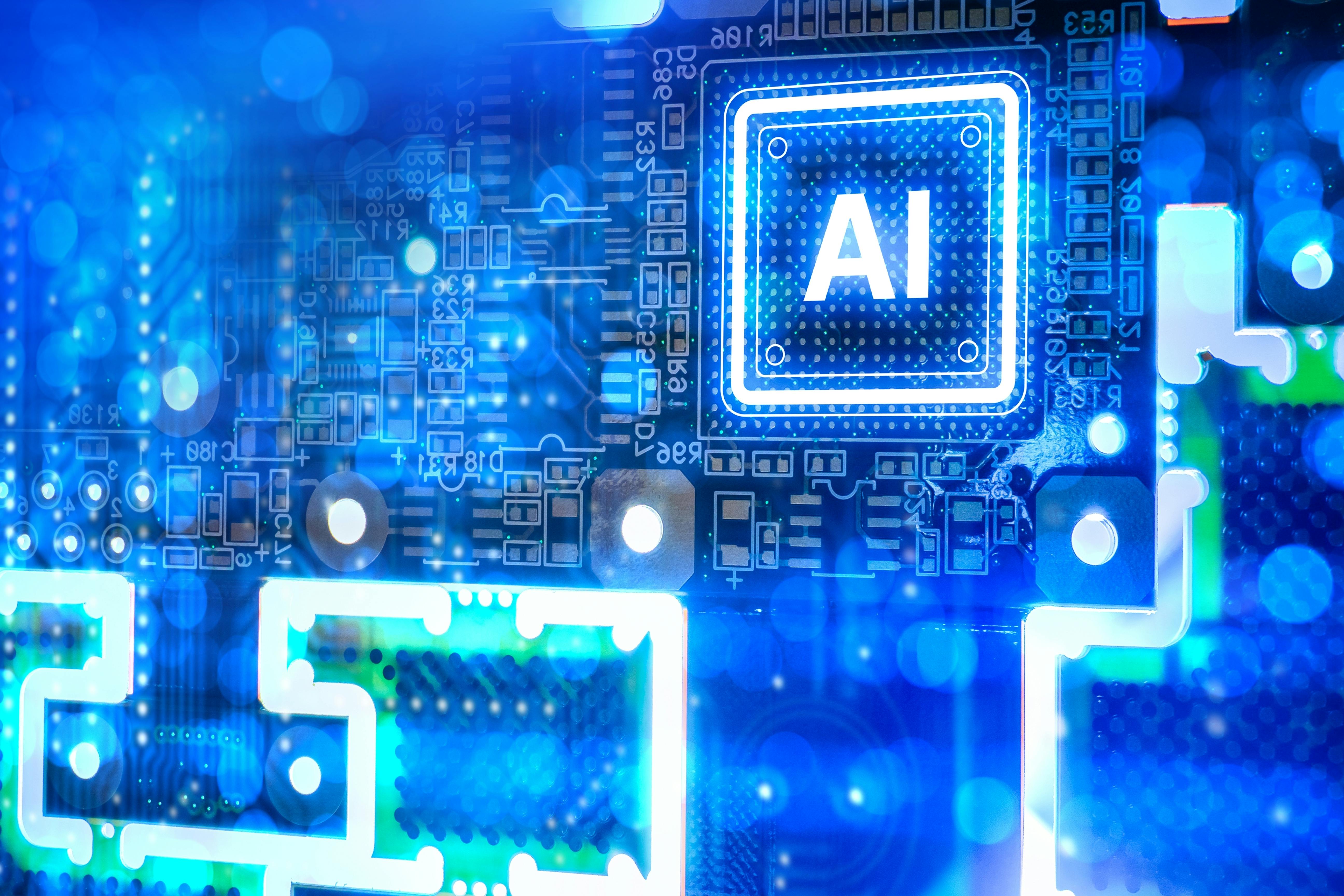 Artificial intelligence development, glowing AI processor chip mounted on electronic circuit board symbolizes machine learning computing power and advanced semiconductor technology.