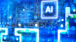 Artificial intelligence development, glowing AI processor chip mounted on electronic circuit board symbolizes machine learning computing power and advanced semiconductor technology.