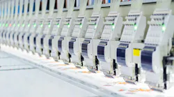 Industrial embroidery and sewing machines Automatic Embroidery Machine In A Clothing Factory Automatic Embroidery Machine in Textile Factory High technology sewing machine control by computer programing