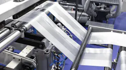 Plastic bag making machine, Packaging machinery, Plastic manufacturing, Industrial automation, Production line.